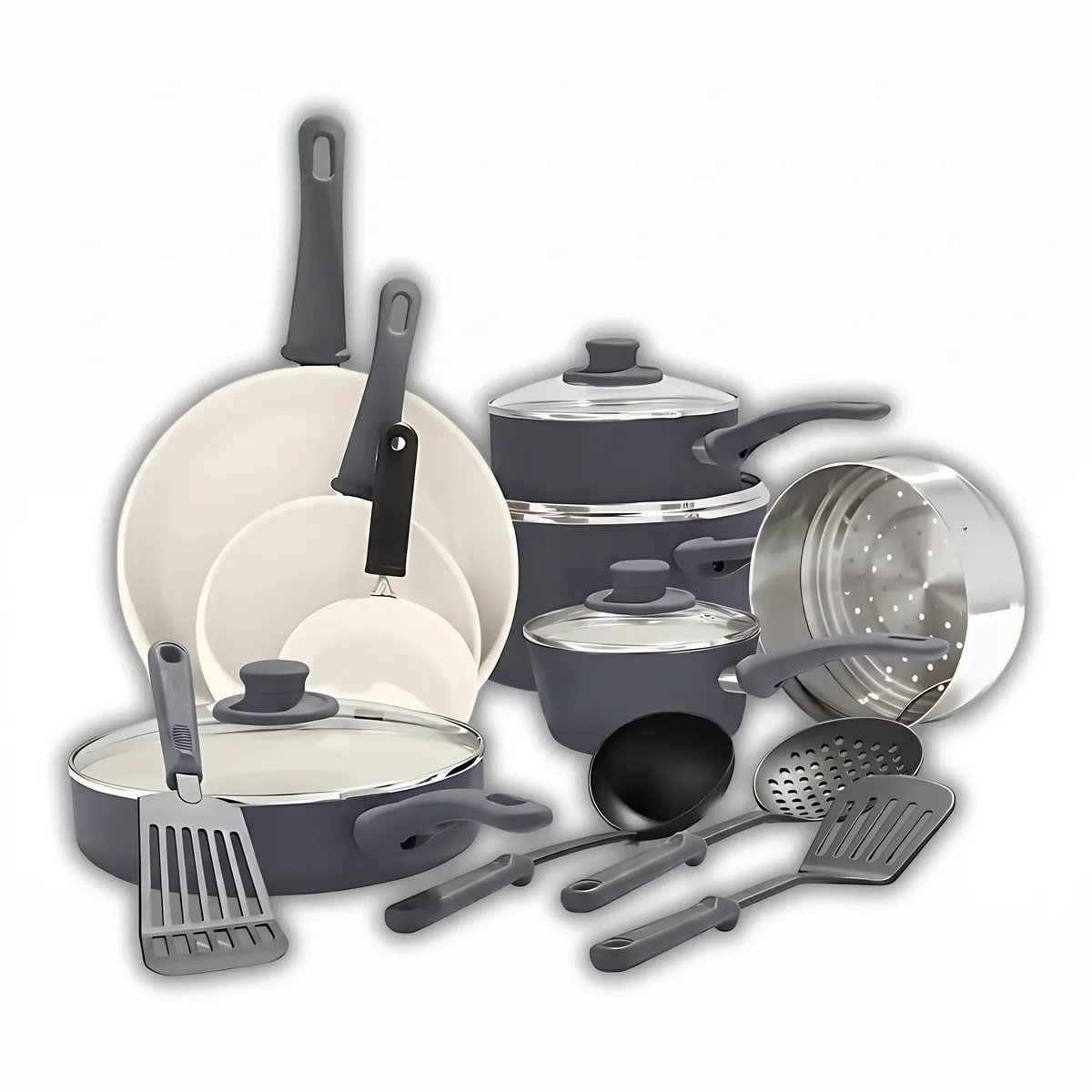 Ceramic non-stick cookware set on a white background. It has three frying pans in graduated sizes with cream-white interiors and grey handles.