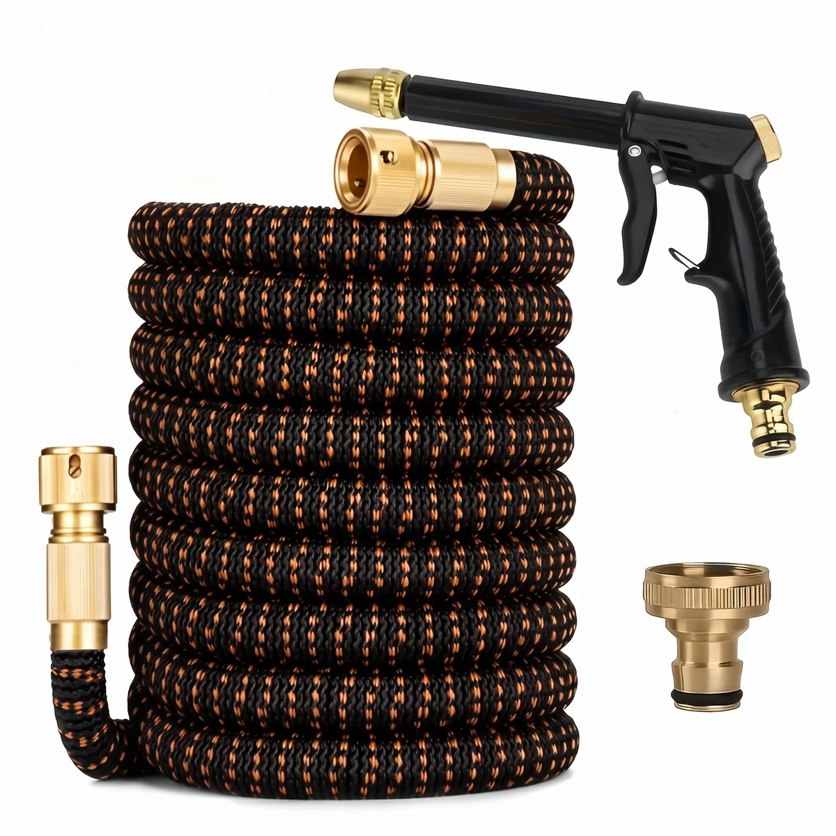 Coiled black expandable garden hose with an orange-flecked woven fabric cover and brass quick-connect fittings on both ends.
