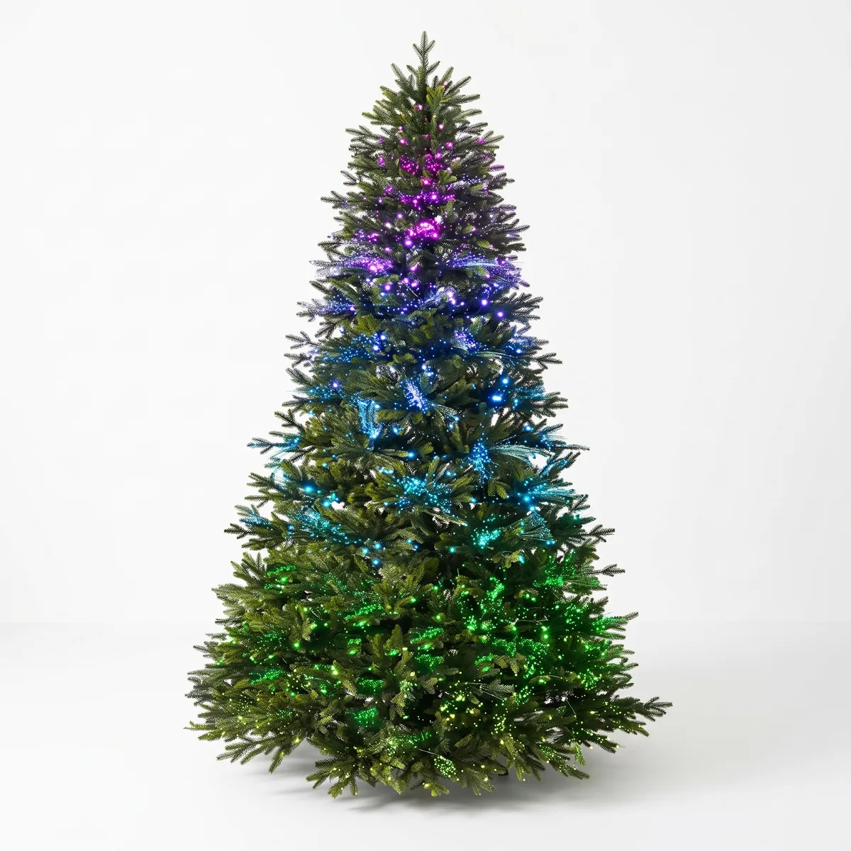 Artificial Christmas tree, 210 cm, with built-in multicolour LED lights glowing from purple at the top to green at the bottom, on a white background.