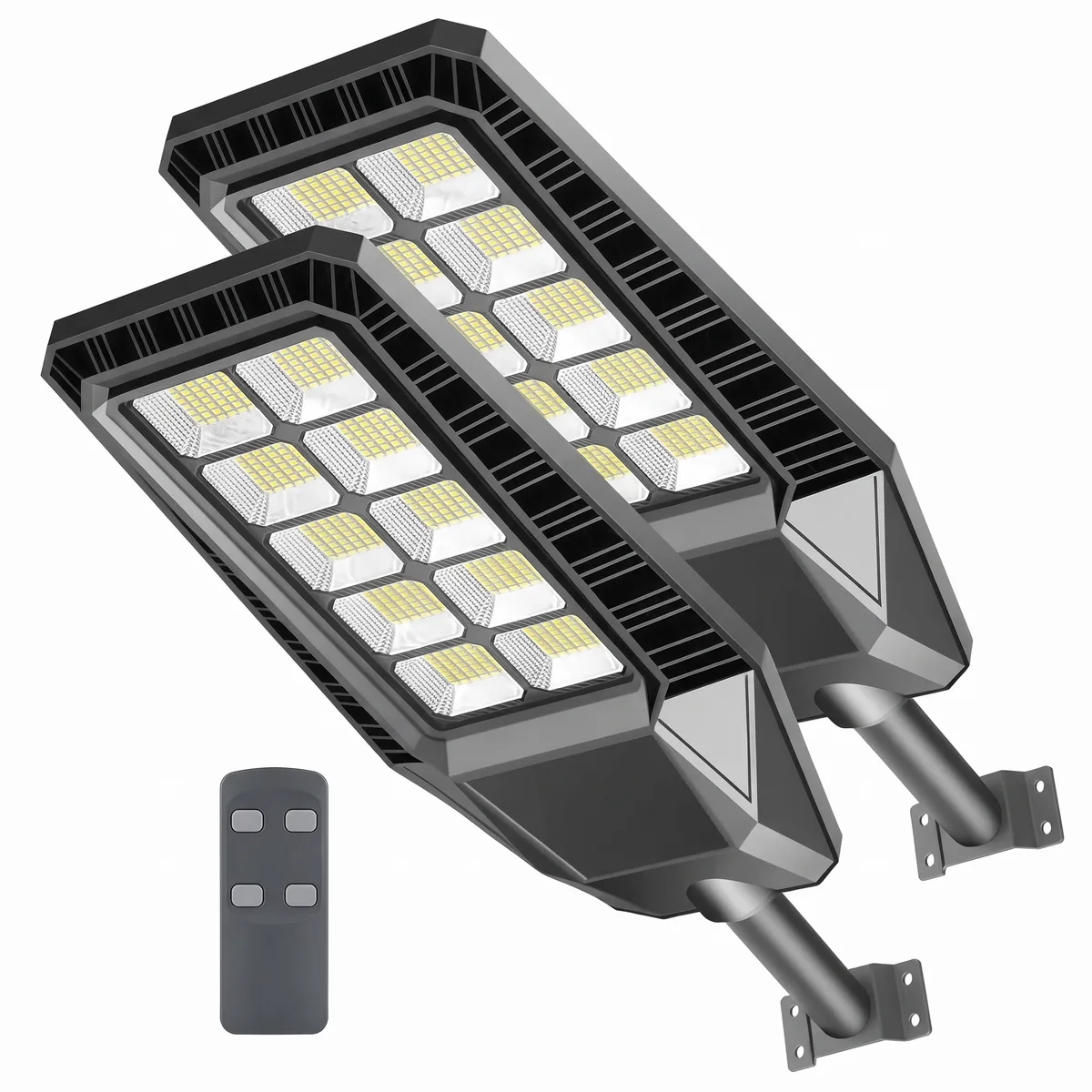 Two dark grey solar LED street-style lights on a white background, one behind the other, angled diagonally, with a remote control.